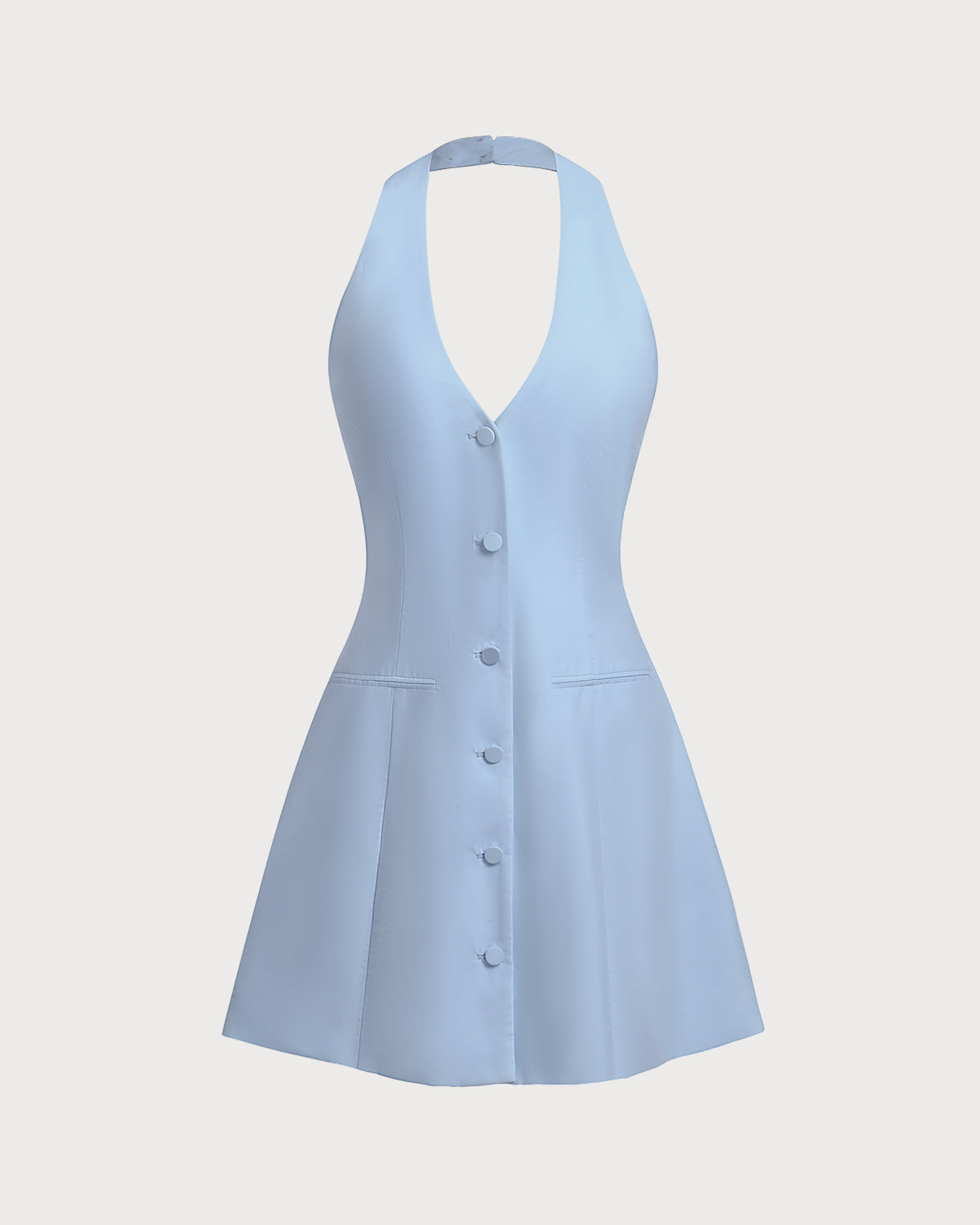 Modra halter mini obleka Mila Ljubljana, kratka in elegantna, prikazana na modelu na sliki.