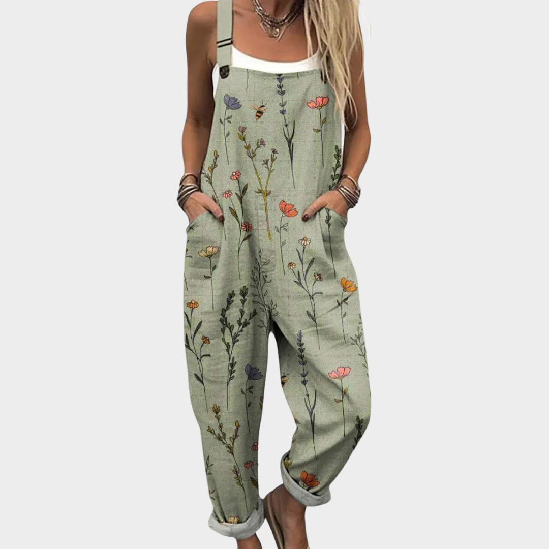 Udobna potiskana salopeta Alma Ljubljana, jumpsuit z vzorcem in udobnim krojem, prikazana v sliki.