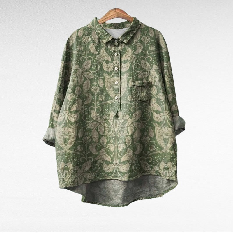 Elegantna vintage bluzica Mireva Alma Ljubljana, bela z čipkastimi detajli in kratkimi rokavi, visoko kakovostne izdelave.