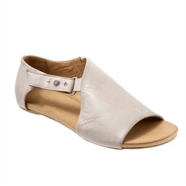 Asimetrični sandali cut-out peep toe v enotni barvi z naramnicami in sponko
