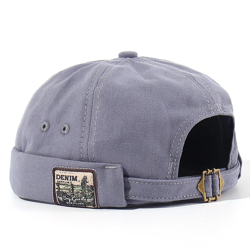 Alma™ Vintage Docker psička, jesenja postava, s klasičnim vintage stilom, prikazana na sliki.