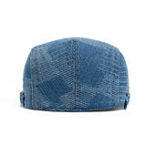 Modra moška kapa Alma™ Denim iz blagovne znamke Alma Ljubljana, izdelana iz kakovostnega denima, prikazana na sliki.