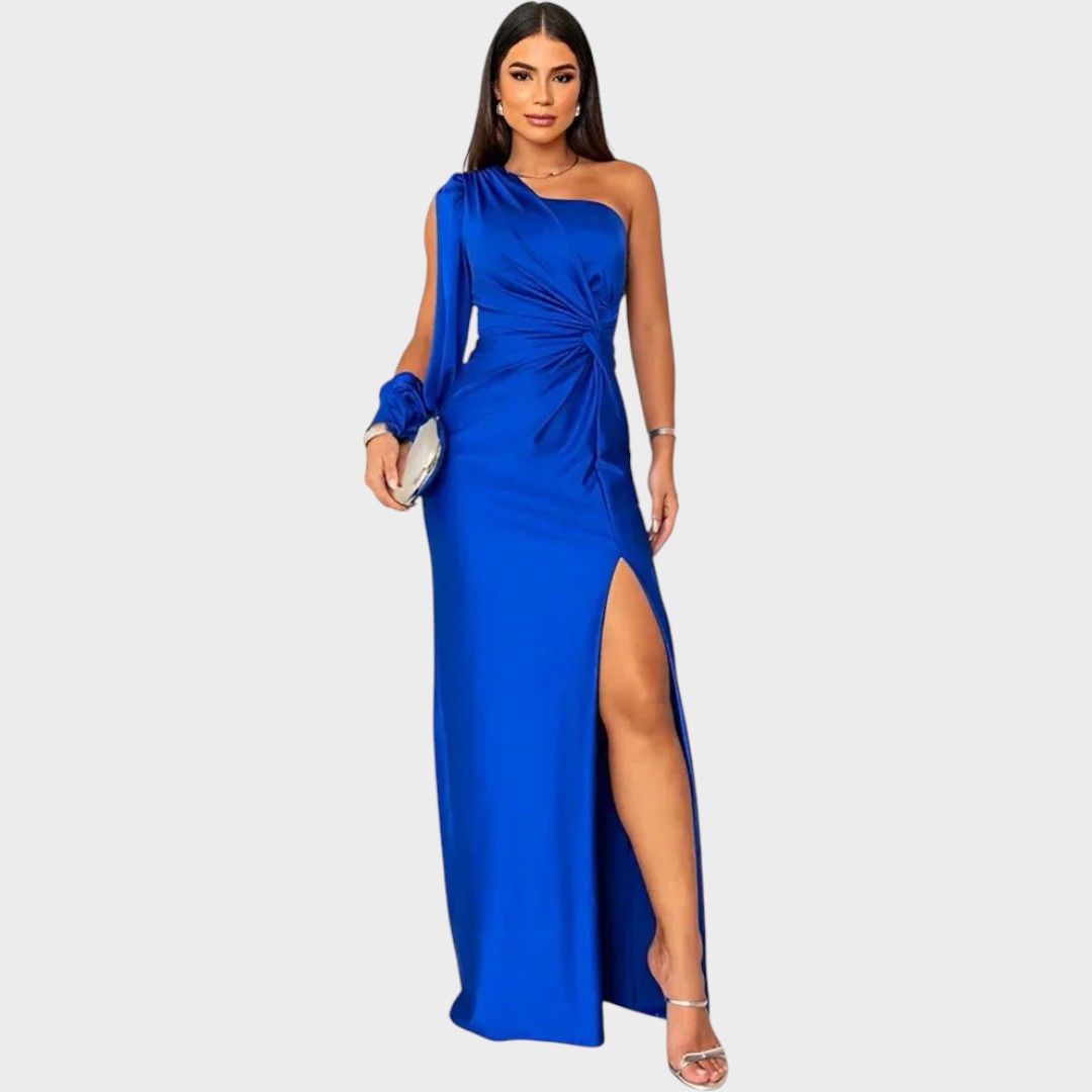 Elegantna modra dolga obleka na eno ramo znamke Mila Ljubljana, prikazana na modelu na sliki.
