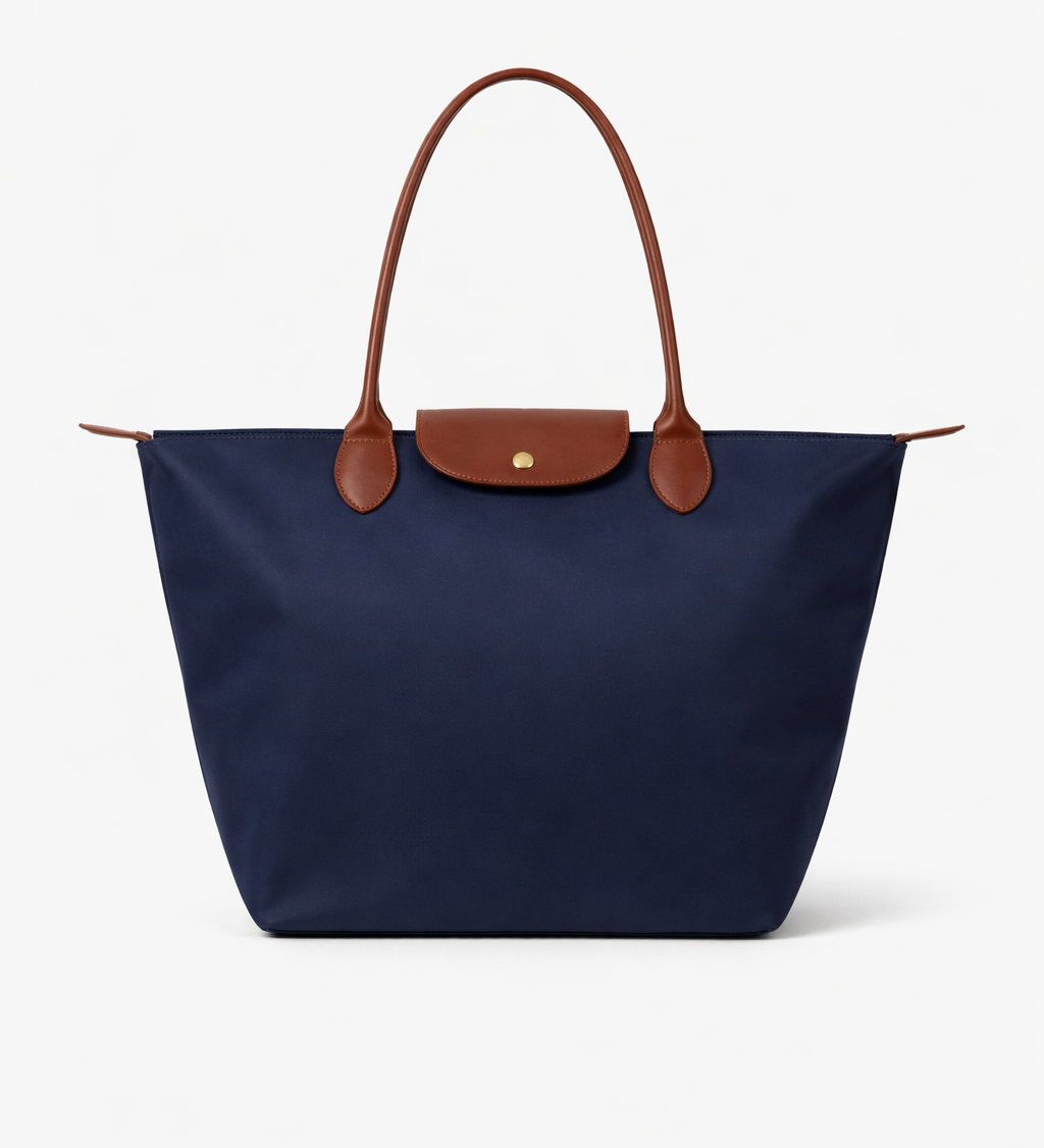 Modra oxford torba Dragoslava Mila Ljubljana, elegantna ženska torba iz kakovostnih materialov, prikazana na sliki.