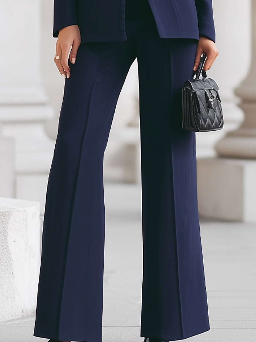 Elegantni črni blazer in hlače set Solenne Alma Ljubljana, modni poslovni suiting za ženske