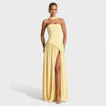 Elegantna rumena gala obleka Nadia Mila Ljubljana, s nežnim krojem in fine detajli, prikazana na modelu.